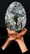 Septarian Dragon Egg Geode With Calcite Crystals #33497-2